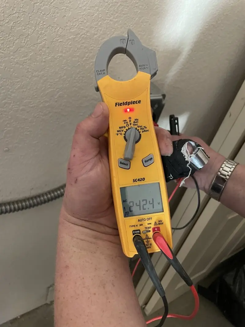 Voltage testing with clamp meter during Generator Installation in Shenandoah